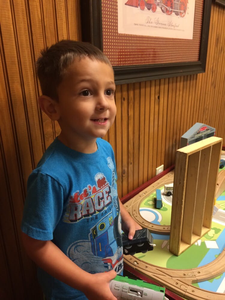 Happy camper with all the trains. | Yelp