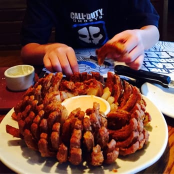 Outback Steakhouse starts fresh every day to create the flavors that our mates crave. Best known for grilled steaks, chicken and seafood, Outback also offers a wide variety of /5().