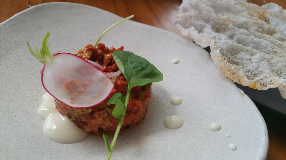 Momotaro - Chicago, IL, United States. Momotaro tartare with tomatoe and maui onion with rice chip