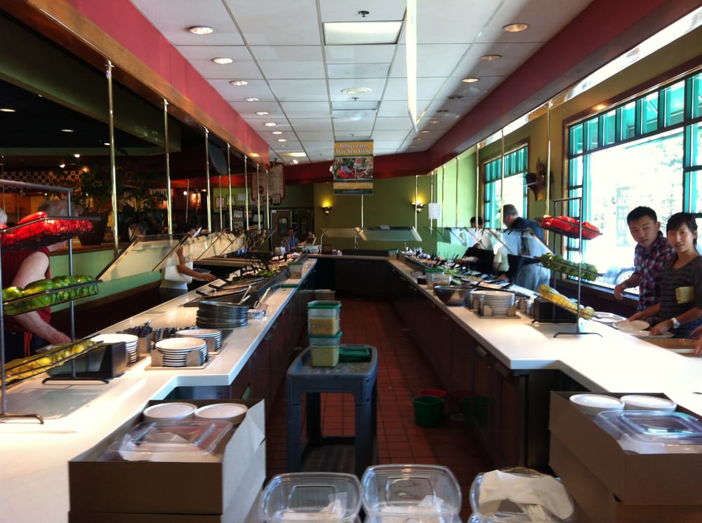 Salad bar! With yummy delights like strawberry spinach salad and