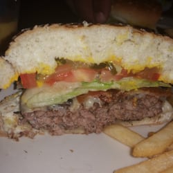 cooked cheeseburger bacon close grill bar mary harrington