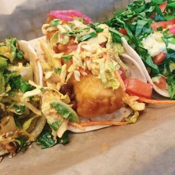 Del Seoul - Chicago, IL, United States. Sesame-Chili Shrimp, Sambal Fish and Blackened Tofu tacos (l to r)