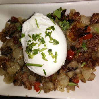 Cafe Ba-Ba-Reeba! - Chicago, IL, United States. Hash with egg (yolk oozes out!) on top