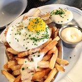 Au Cheval - Chicago, IL, United States. Fries with a fried egg