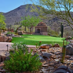 Desert landscape with artificial turf…