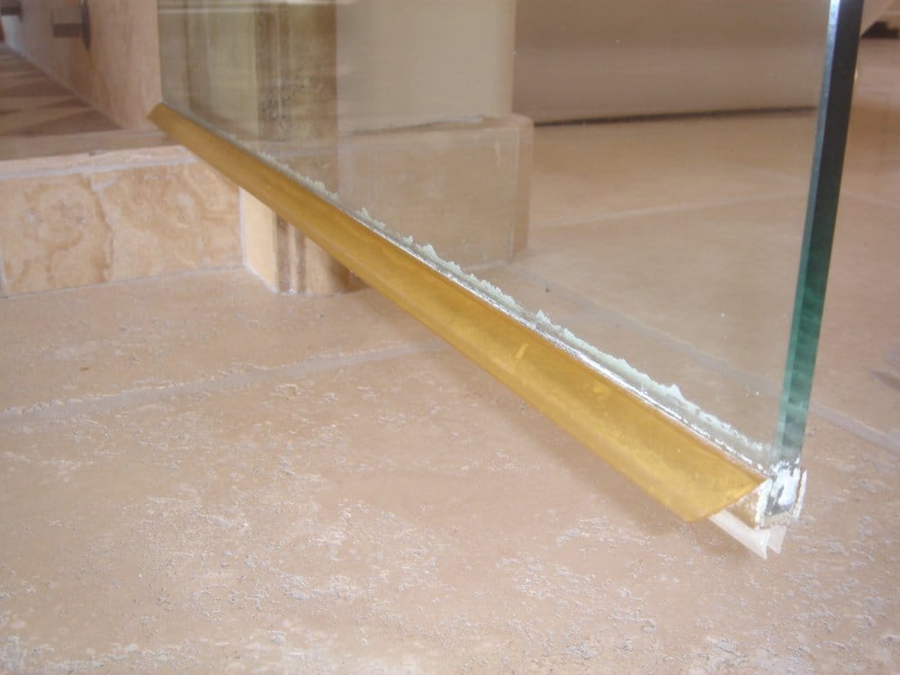 replacing glass shower door sweep