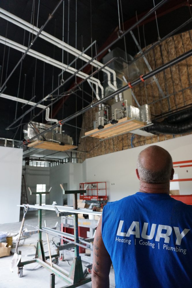 Laury Heating Cooling Plumbing Performing An Installation At Photo Of Laury Heating Cooling Plumbing Vineland Nj United States
