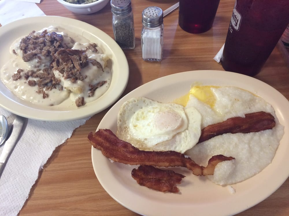eggs bacon grits sausage gravy and biscuits great food great