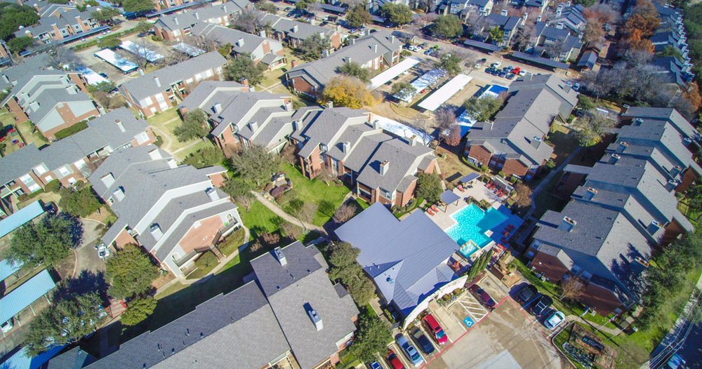 Multi Family Re Roof That Involved Shingles Standing Seam Metal