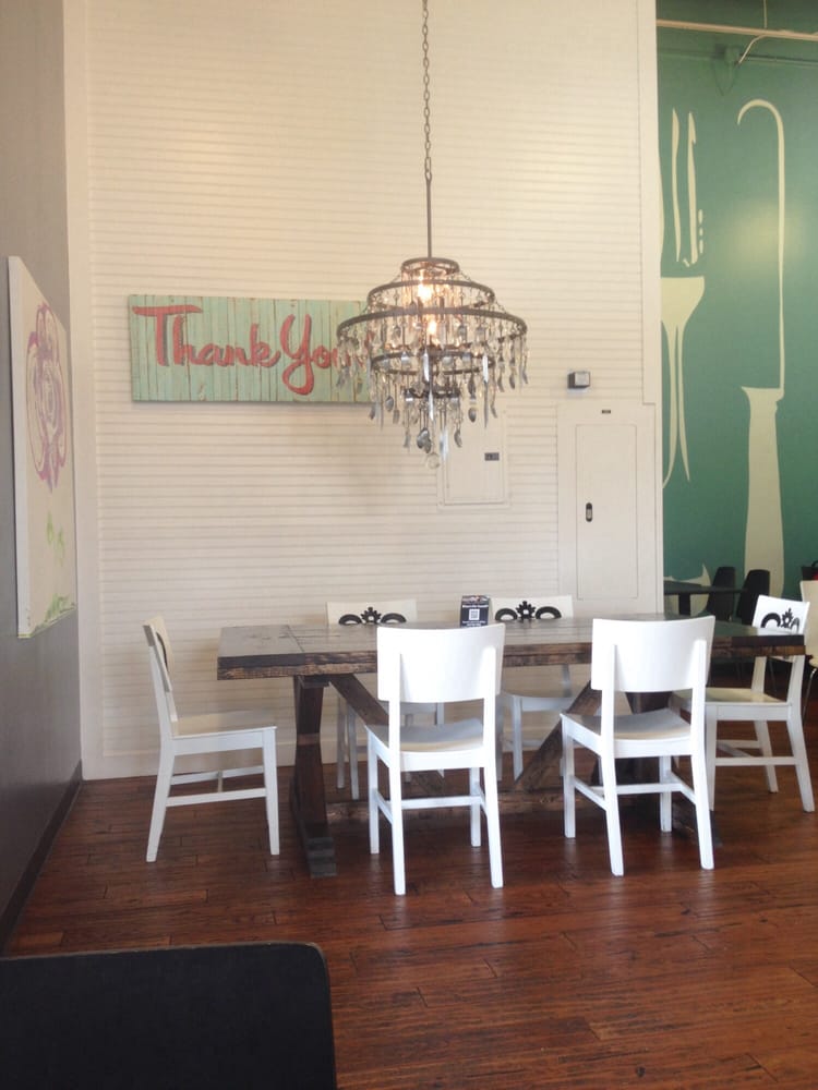 Big Table For A Group The Chandelier Is Made Out Of Utensils Photo Of Blu Moon Cafe Carmel In United States Big Table For
