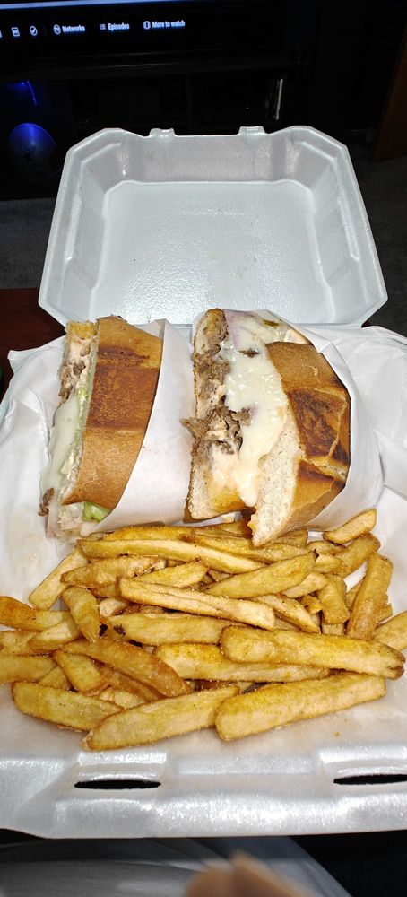 Juarez Phillys Logo
