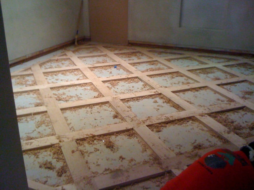 wooden floor with tile border  | 640 x 427