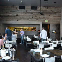 Red Medicine - Beverly Hills, CA, United States. Dining room, looking in from the reception desk.