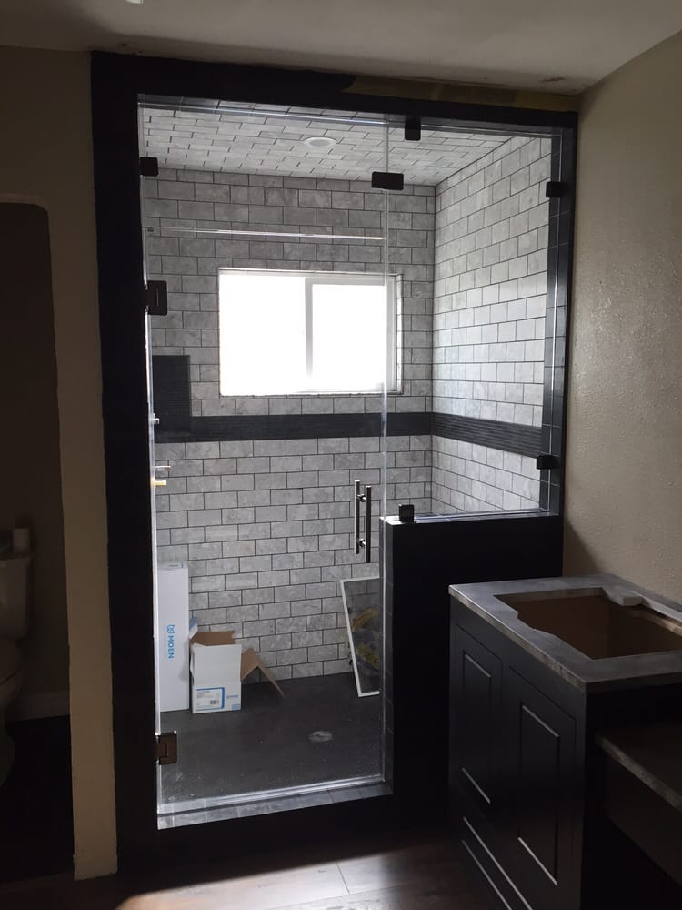 Seamless Glass Door With Upper Transom And Black Nickel Handle Yelp Photo Of A1 Shower Door Company Santa Ana Ca United States Seamless