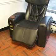 Photo of The Wash Tub of Hartford Laundromat - Hartford, CT, United States. Massage chair for your comfort but it had water on the seat due to the AC right above it