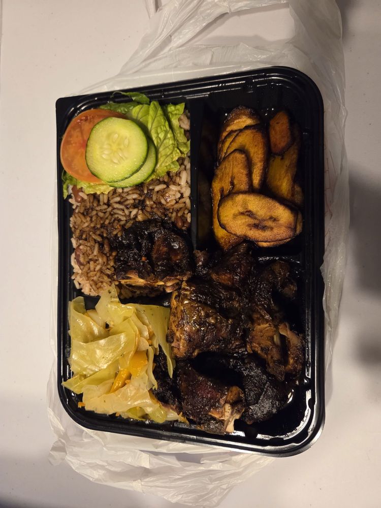 Mouthwatering Jamaican Grill Logo