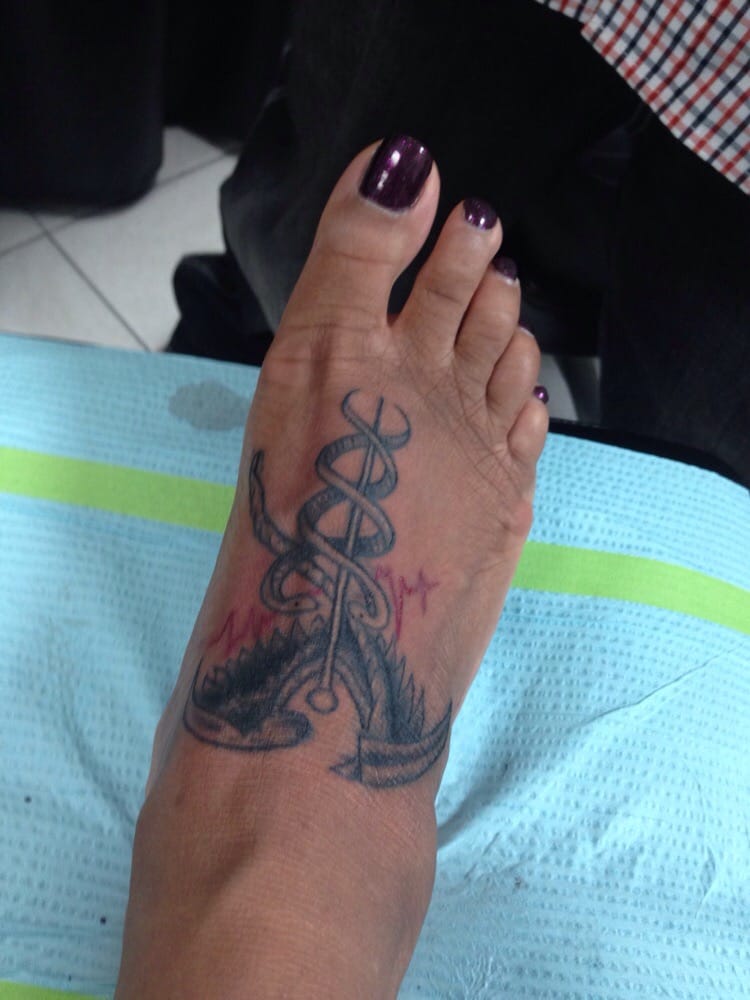 Outlaw Custom Tattoo 
