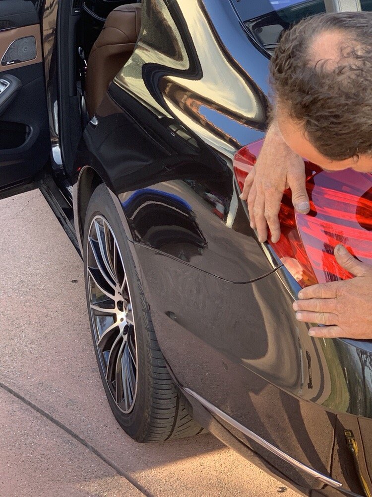 The Dent Whisperer Paintless Dent Removal
