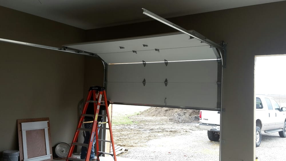 Finishing Up A Few Little Things On This Garage Door Installation Photo Of Subcon Garage Doors Springfield Il United States Finishing Up A