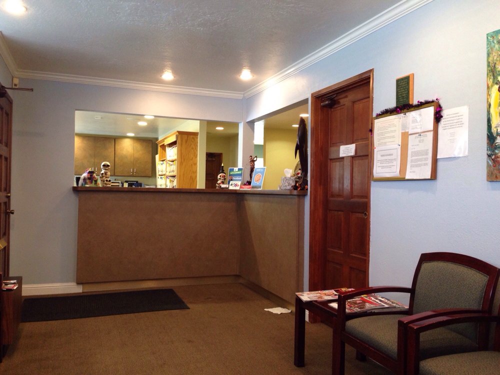 image of business John Comyns, DDS - Smiletenders