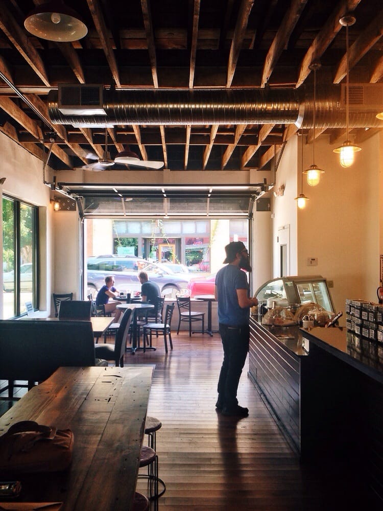 Garage Doors At The Front And Back Open To Street Deck Photo Of Odd S Cafe Asheville Nc United States Garage Doors At The