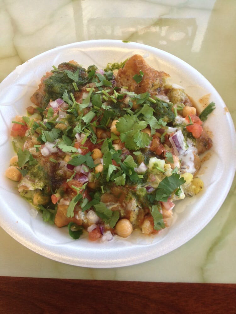 Samosa chaat with chickpeas, veggies, tasty sauce - Yelp