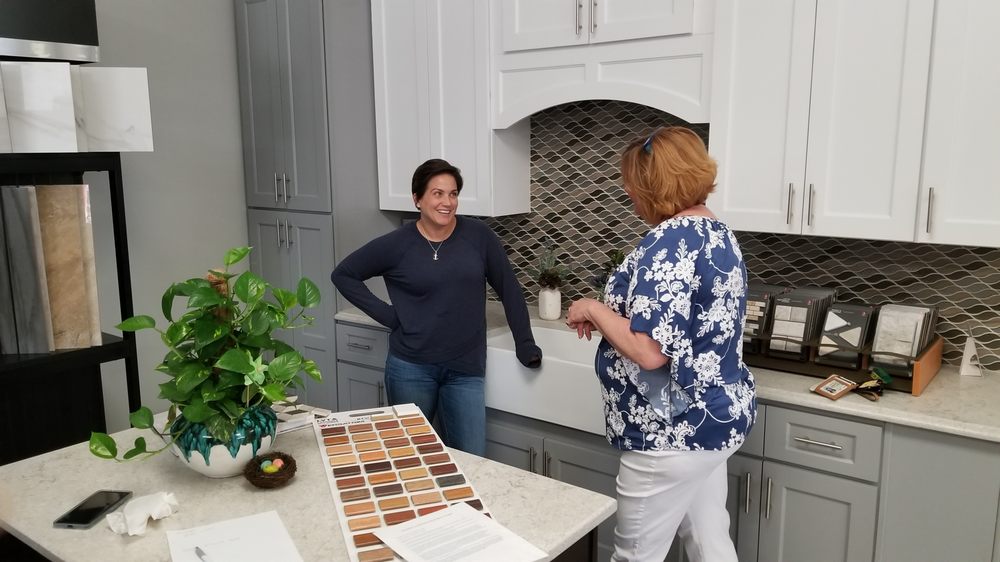Owner Amie Helps A Customer Match Tile To Her Cabinets Yelp Photo Of Cape Fear Flooring And Restoration Fayetteville Nc United States Owner