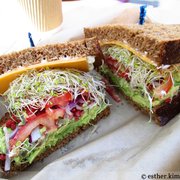 Photo of The Trails - Los Angeles, CA, United States. Avocado Sandwich (with Tomato, Red Onion, Soy Bacon Bits, Alfalfa Sprouts, Cheddar Cheese, Mayo)