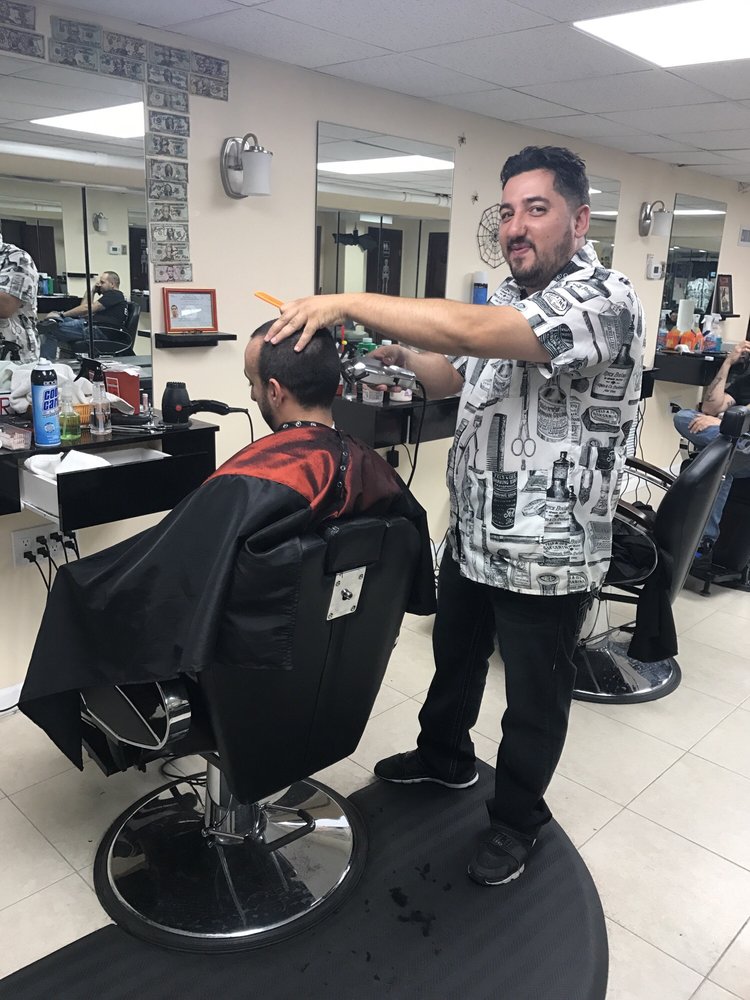 Russell’s VIP Barber Shop Barbers 7534 Metropolitan Ave, Middle