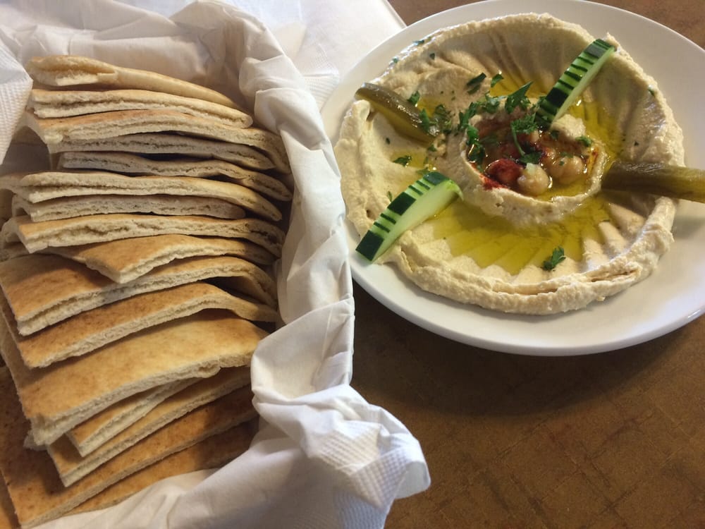 Hummus and lots if pita bread Yelp