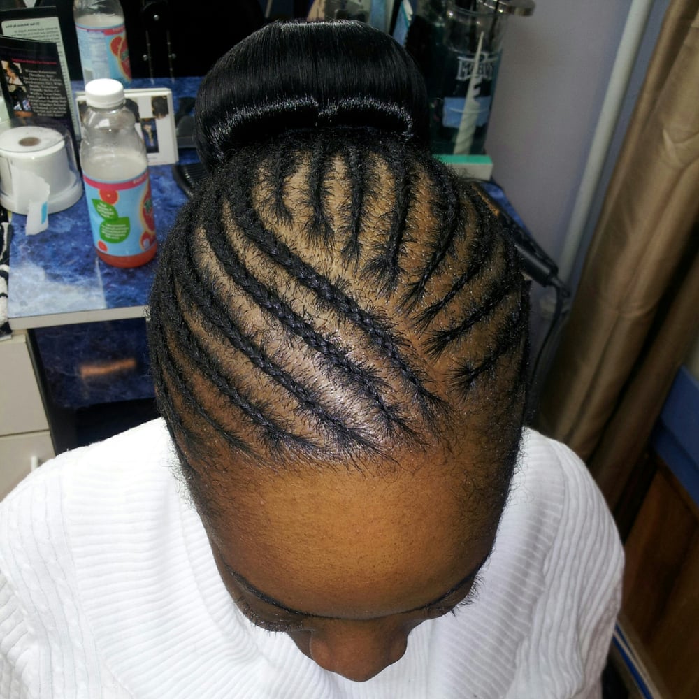 Cornrows into a Weave Bun Yelp