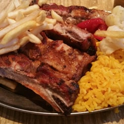 McWhorter Barbecue - Newark, NJ, United States. Half order pork ribs, phenomenal. Delicious. $7 I ate many fries so you can see how great the ribs are.