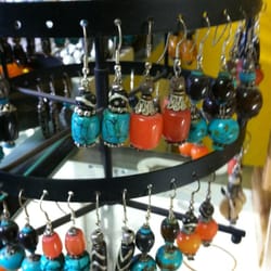 Photo of Ocean Queen Himilayan Handcraft/Tibetan Shop - Haleiwa, HI, United States. Earrings with stones from Nepal