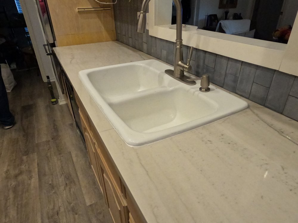 Mena Stone Surfaces - Quartz and granite countertops