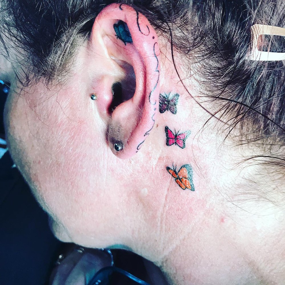3 Red Butterfly Tattoos Behind the Ear