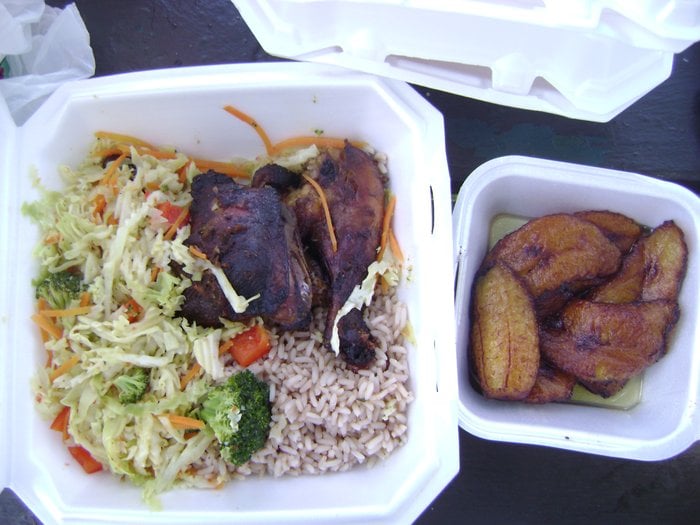 Jerk Chicken, Rice and Peas, Jamaican Cabbage and Fried Plantains on