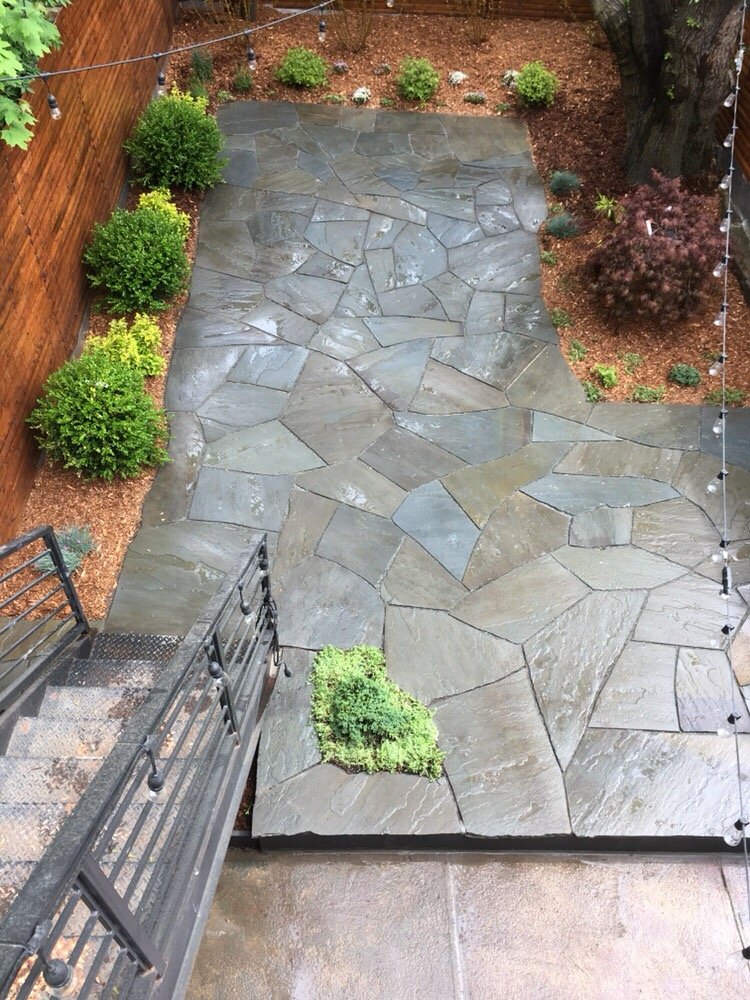 Irregular Bluestone Patio Elished Planting Bed With Shrubs And Photo Of Brooklyn Landscape Design Ny United States Irregular Bluestone Patio