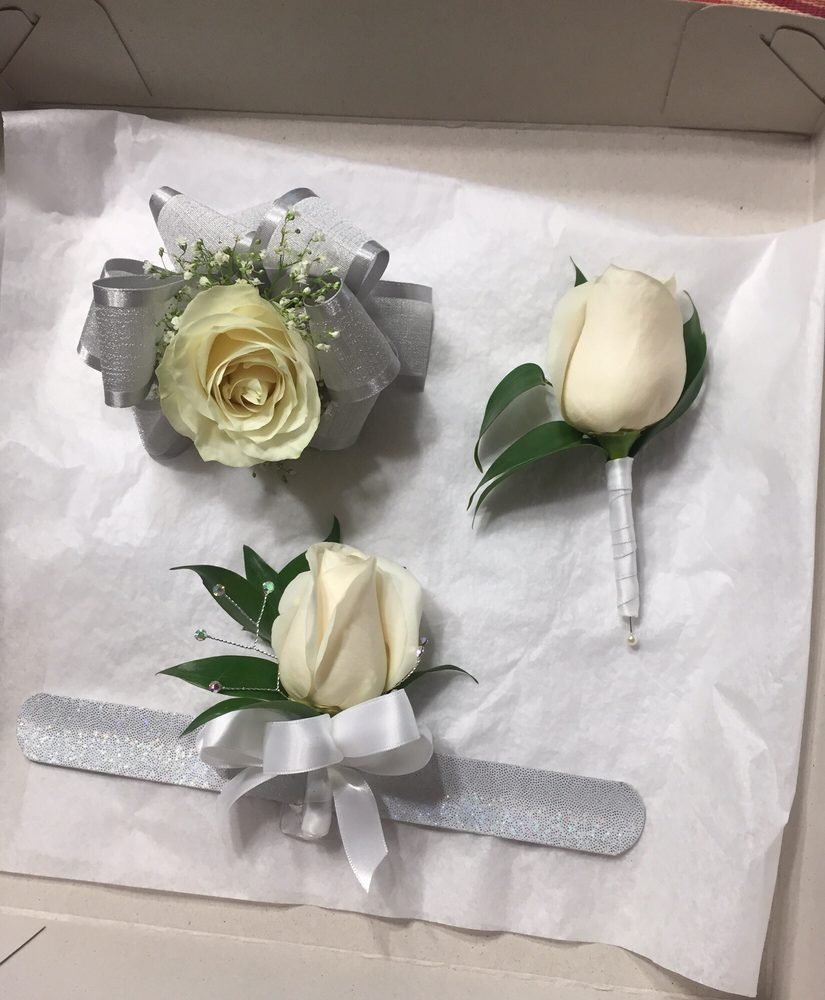 White Garden Rose Boutonniere above left) albertsons $16 white rose corsage (above right White Garden Rose Boutonniere above left) albertsons $16 white rose corsage (above right