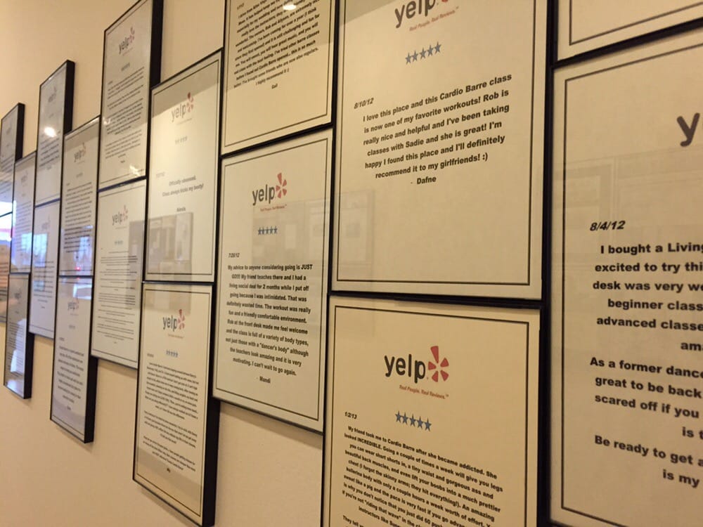 Their Wall Full Of Framed 5 Star Yelp Reviews