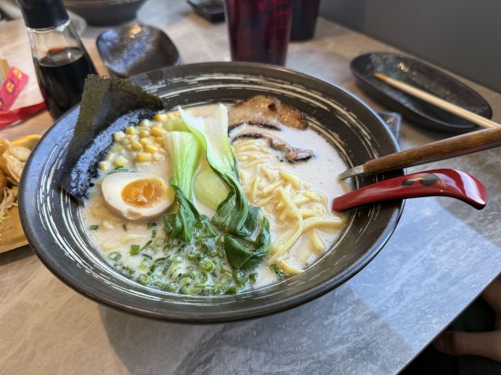 O Ku Sushi & Ramen Logo