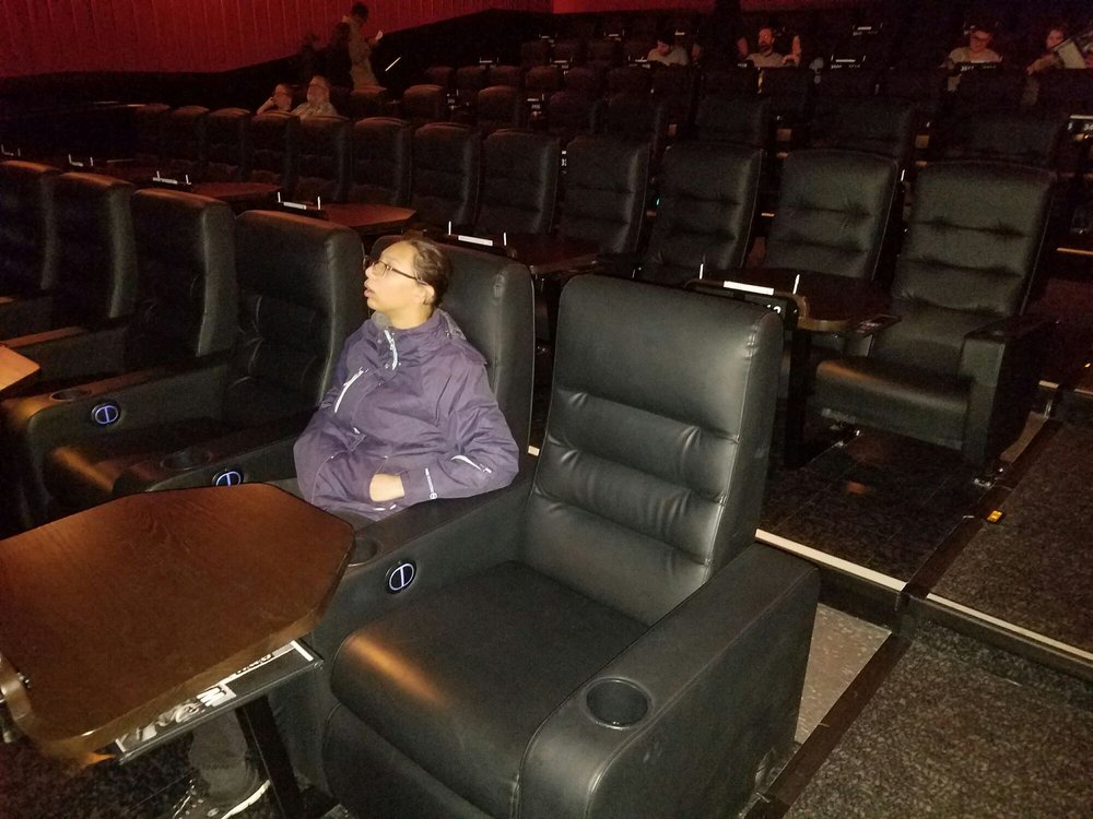 Roomy seats with cup holders. Front row seats recline! Yelp