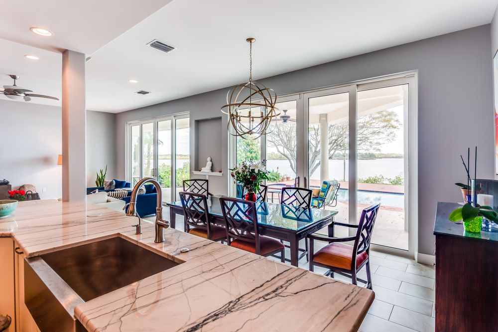 Great Room With New Sliding Glass Doors Overlooking Lanai