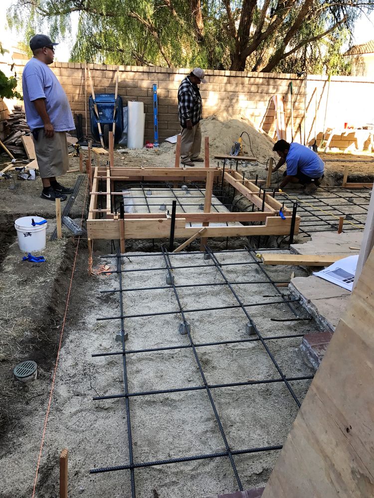 Setting Forms And Rebar Prior To Concrete Slab Pouring For