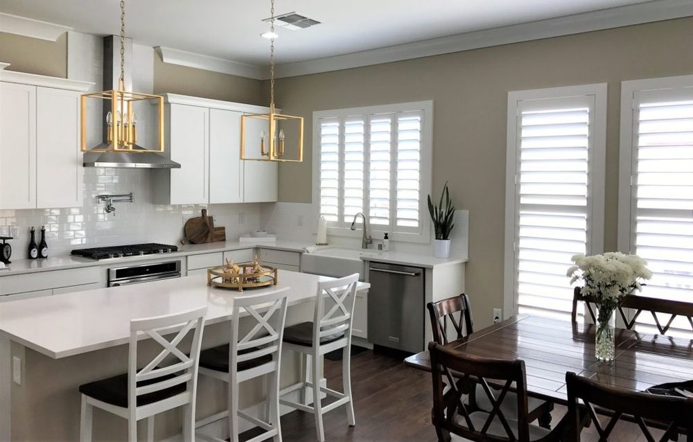 Sunburst Shutters & Window Fashions