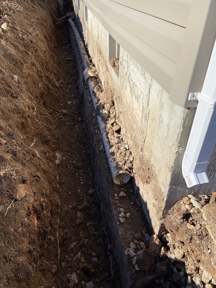 image of business Rogers Backhoe Service