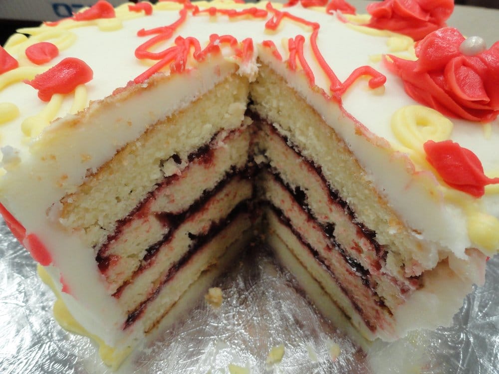 8inch, 4layer, almond cake with raspberry filling