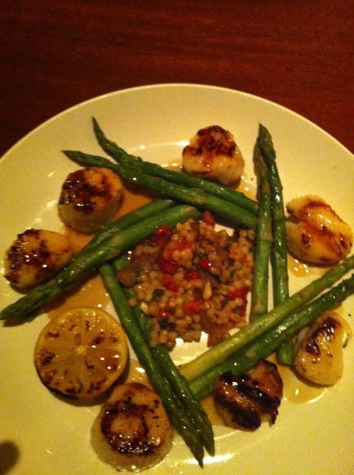 Caramelized Sea Scallops grilled and served with roasted asparagus and