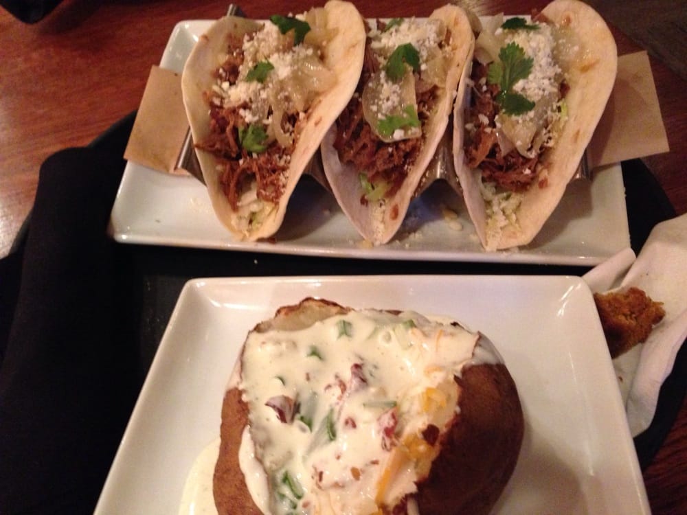 Brisket tacos with a loaded baked potato covered in ranch! Yum Yelp