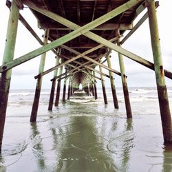 sunset beach fishing pier