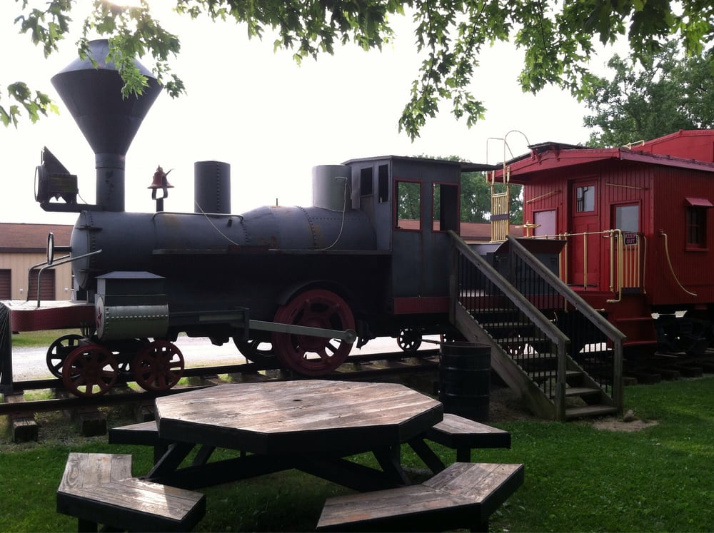 Outside Is A Train Picnic Tables And Fun Things To Look At